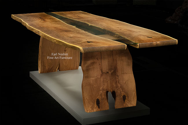 custom made mesquite dining table on pedestal at show